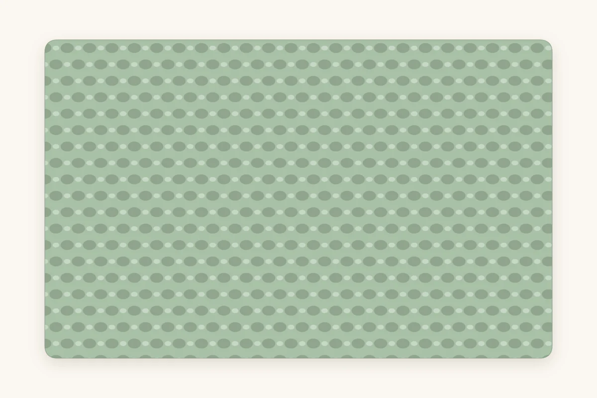Close-up of moss stitch fabric where small stitches sit offset in the gaps of the row below, like a woven texture
