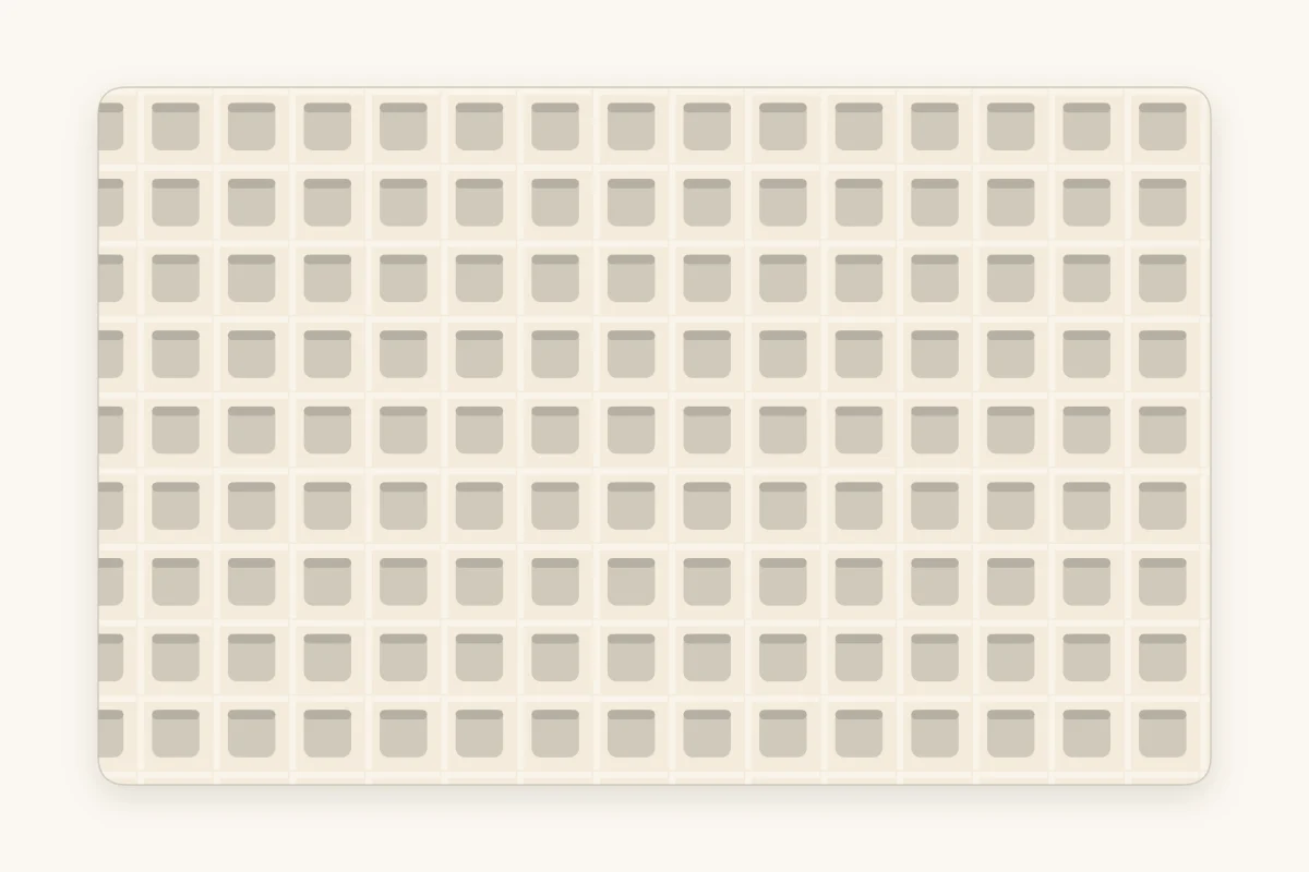 Close-up of waffle stitch fabric showing a raised grid of small recessed squares